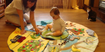 Достоинства и выбор развивающих ковриков для детей